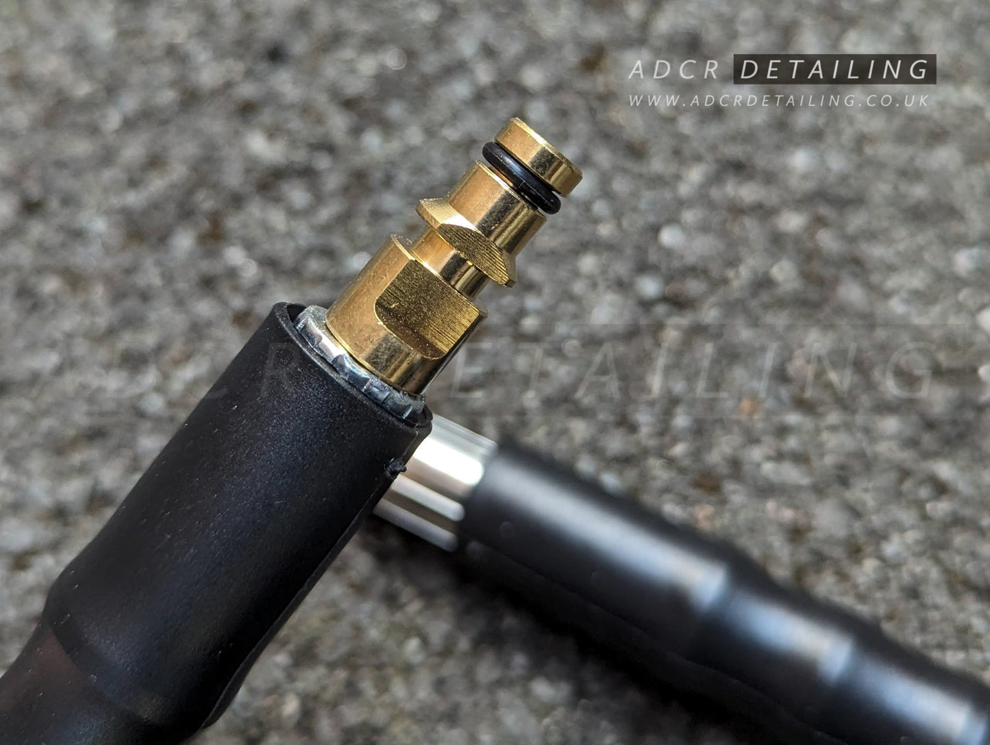 Close up of connector on 10m Pressure Washer Black Hose, Compatible with Karcher K Series. Detailing upgrade