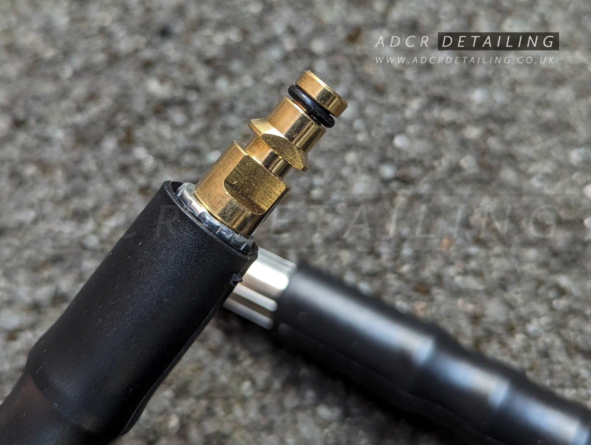 Close up of connector on 10m Pressure Washer Black Hose, Compatible with Karcher K Series. Detailing upgrade