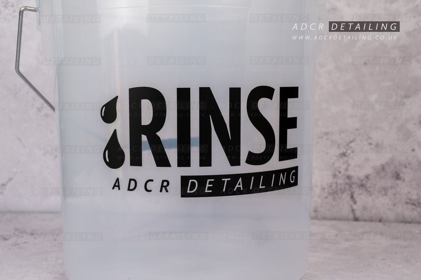 Clear bucket with 'RINSE' and 'ADCR Detailing' decal sticker applied.