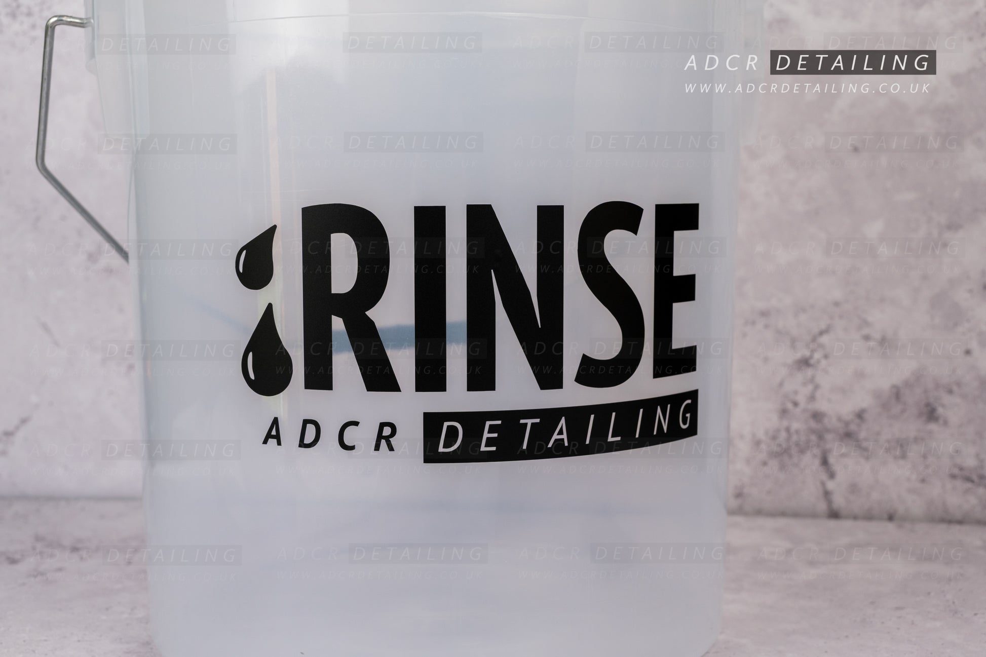 Clear bucket with 'RINSE' and 'ADCR Detailing' decal sticker applied.