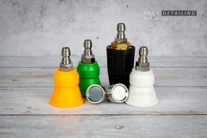 Collection of car detailing nozzles in various colours on a grey surface with 'ADCR Detailing' branding. Premium 1/4in Quick Release Nozzle Bundle. Shower Nozzles, 40 degree, 15 degree, 25 degree and turbo jet nozzle.