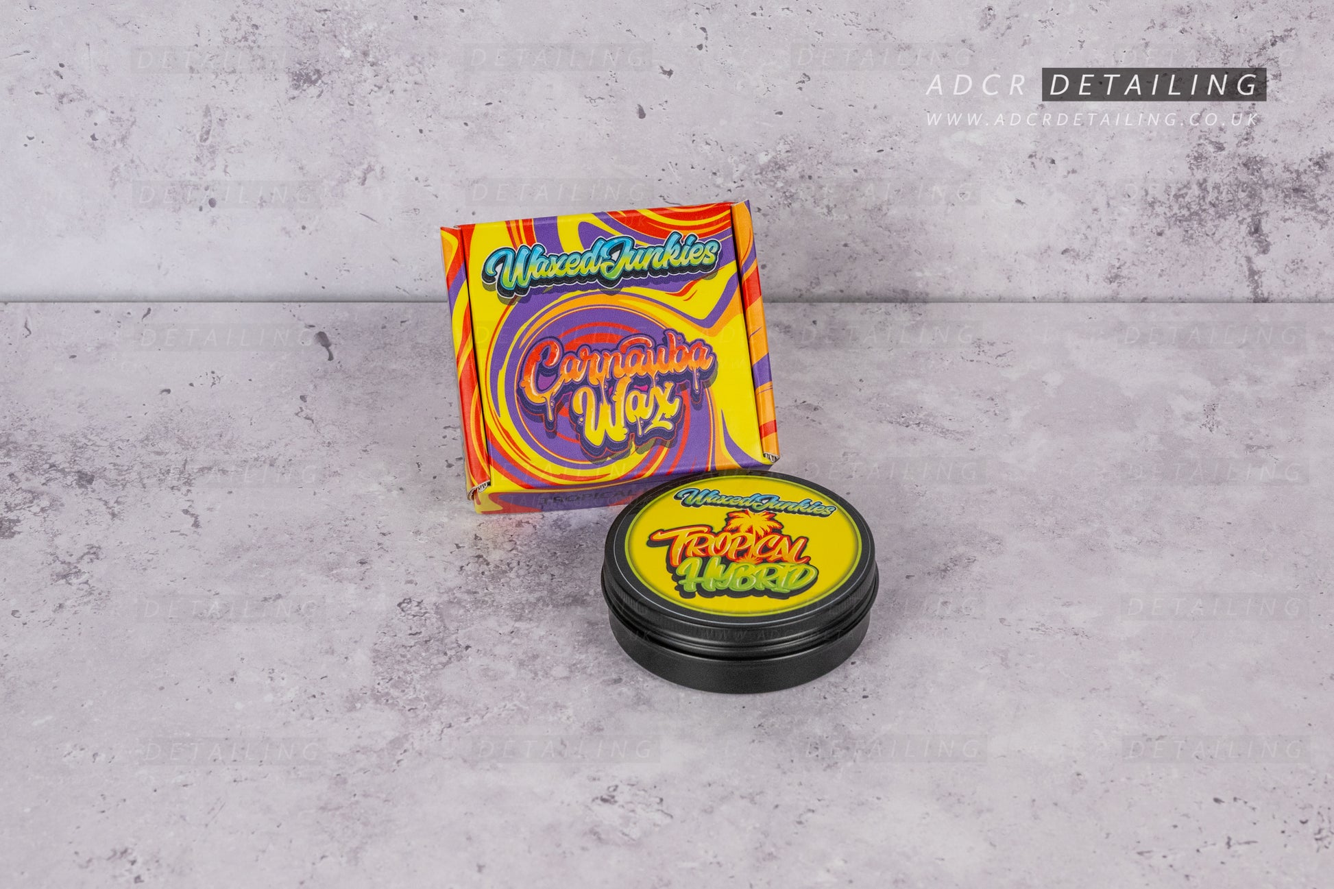 Carnauba Wax  tin with colourful packaging on a gray surface. Detailing traditional wax. 