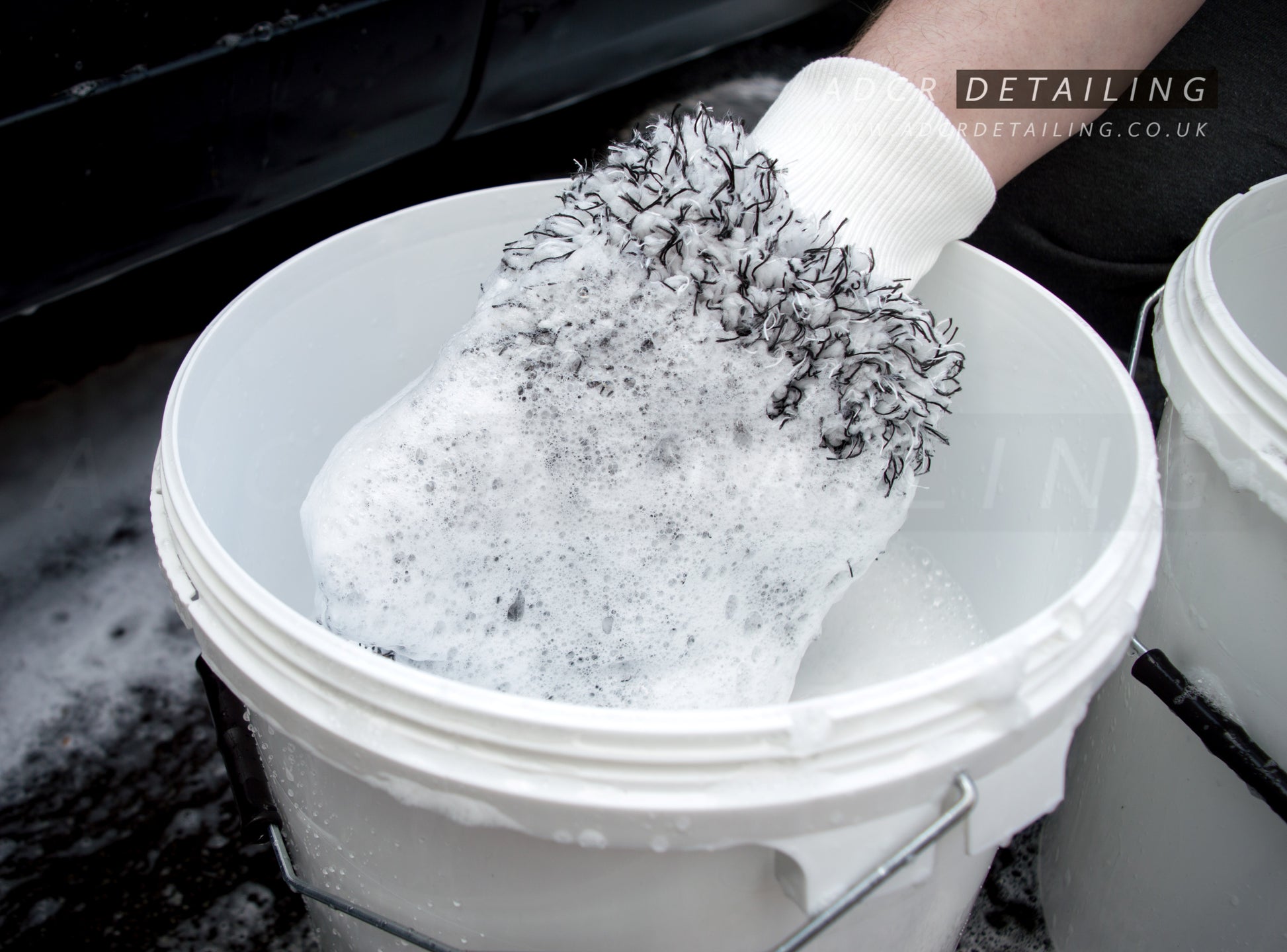 Premium Luxury Detailing Microfibre Wash Mitt - Black & White. Large, premium, thick, padded mitt. In a detailing bucket.